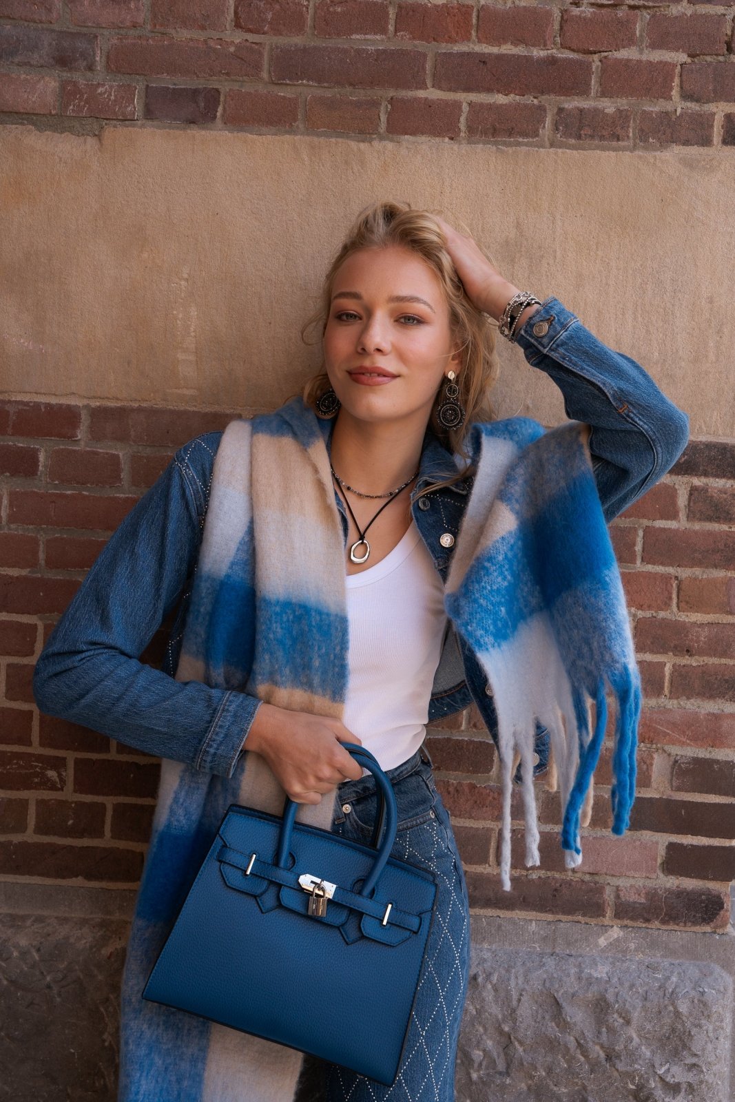 Blauwe handtas met zilverkleurige details en slotje - Nouka