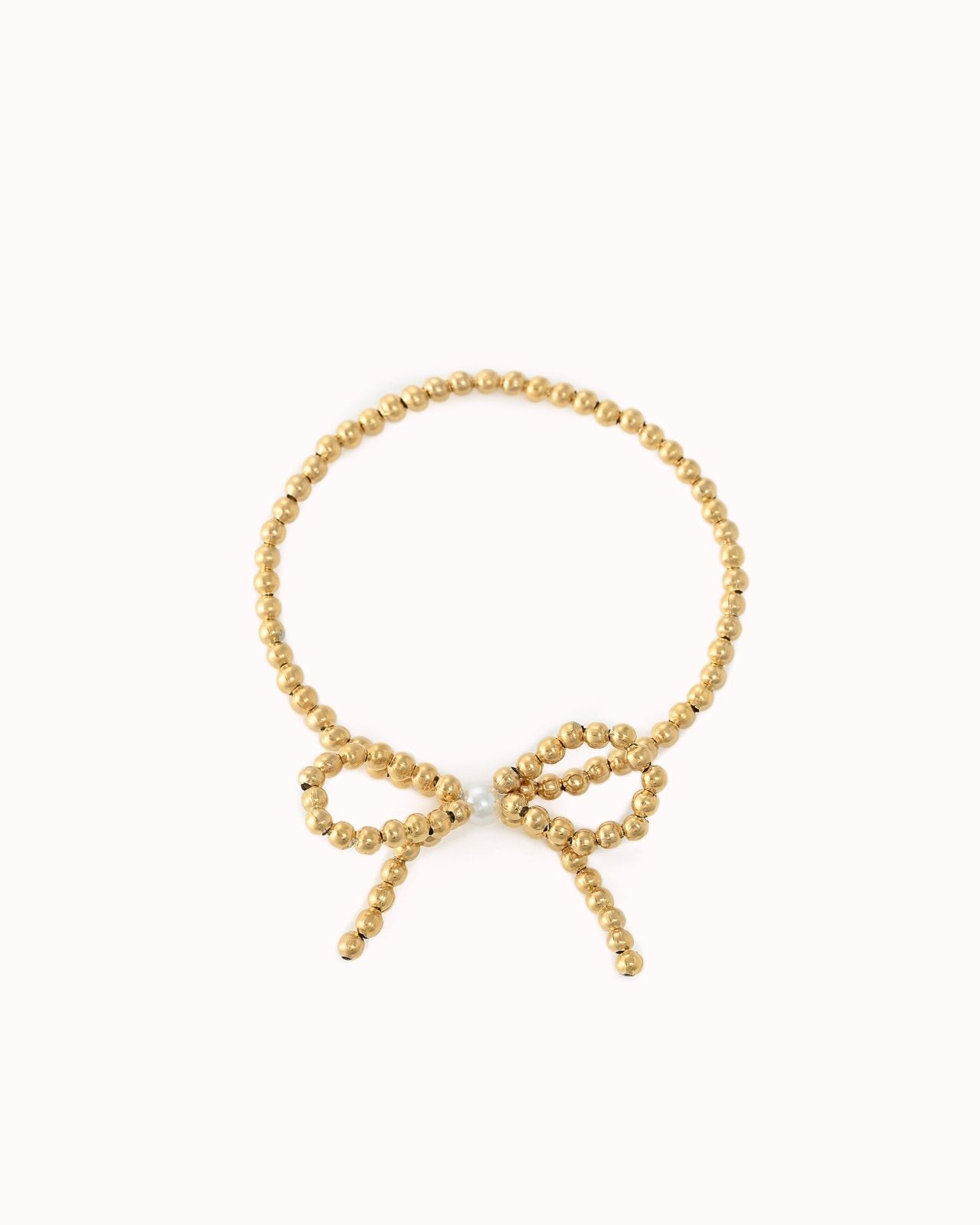 Goudkleurige armband met strik en parel details - Nouka