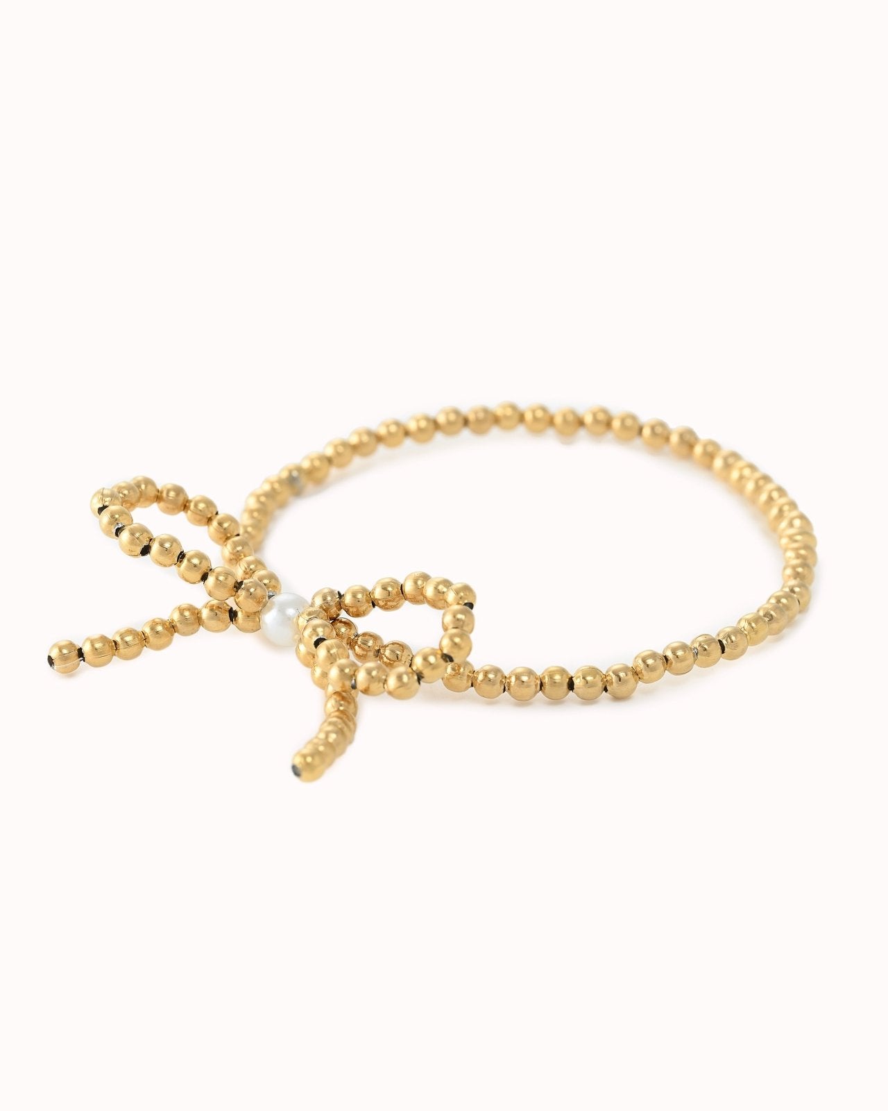 Goudkleurige armband met strik en parel details - Nouka
