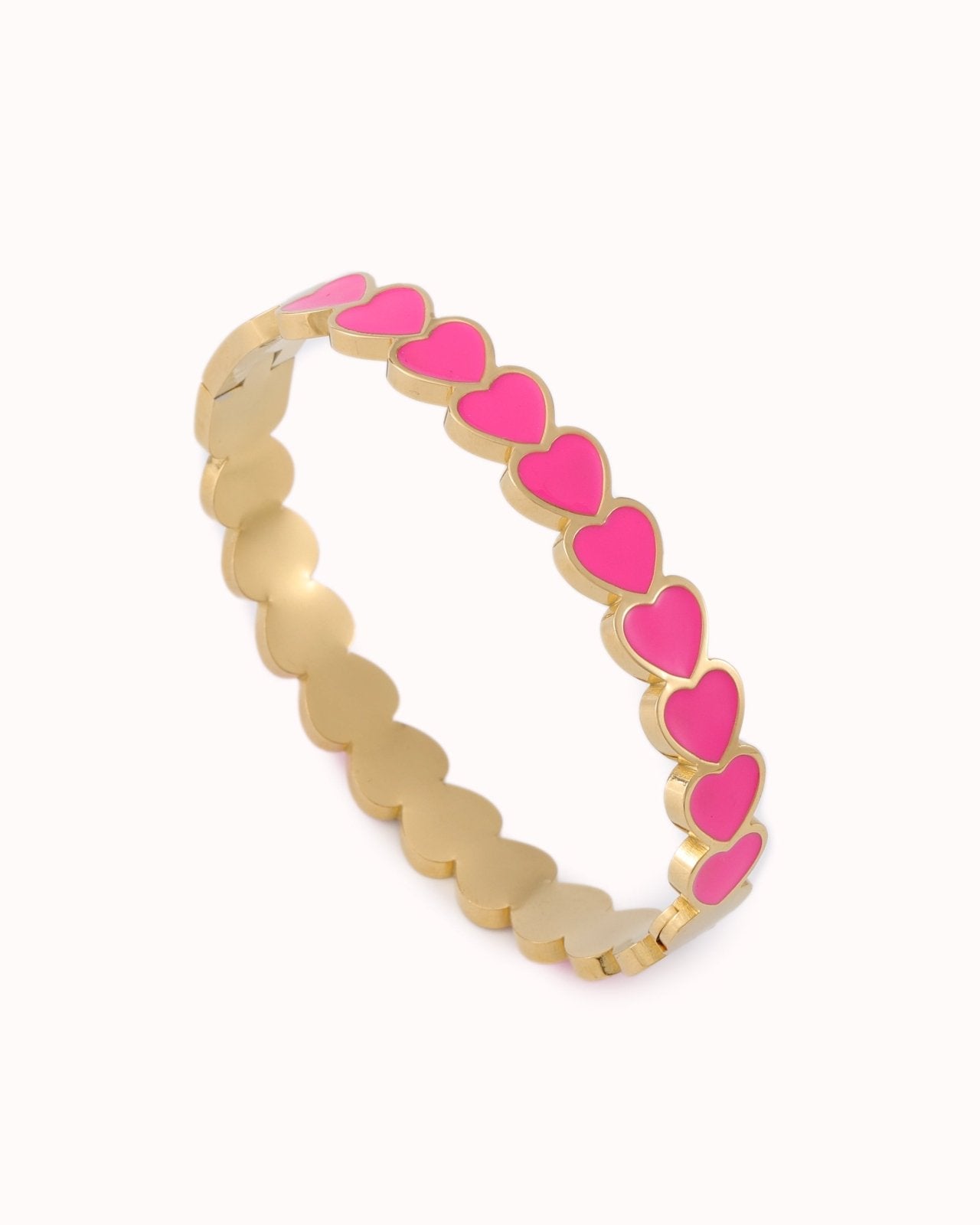 Goudkleurige bangle met roze hartjes - Nouka