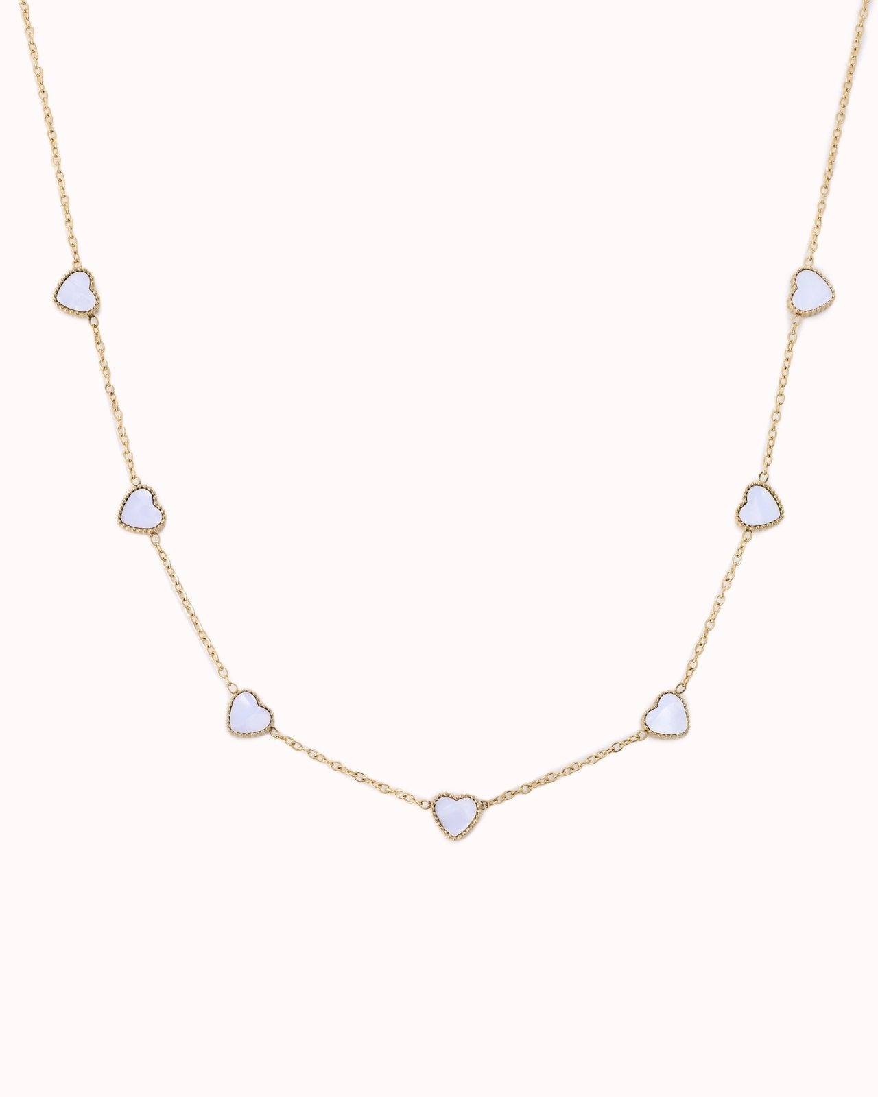 Goudkleurige ketting met parelmoer hartjes - Nouka