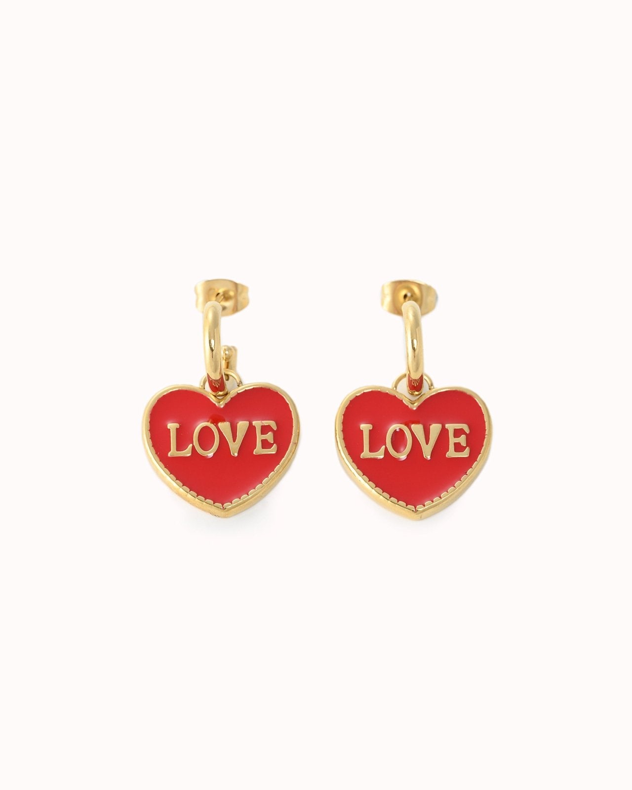Goudkleurige oorbellen met rood love hartje - Nouka