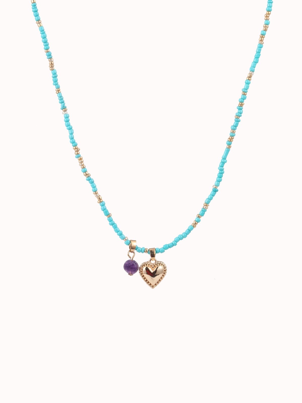 Turquoise kralen ketting met goudkleurige hartjes hanger - Nouka