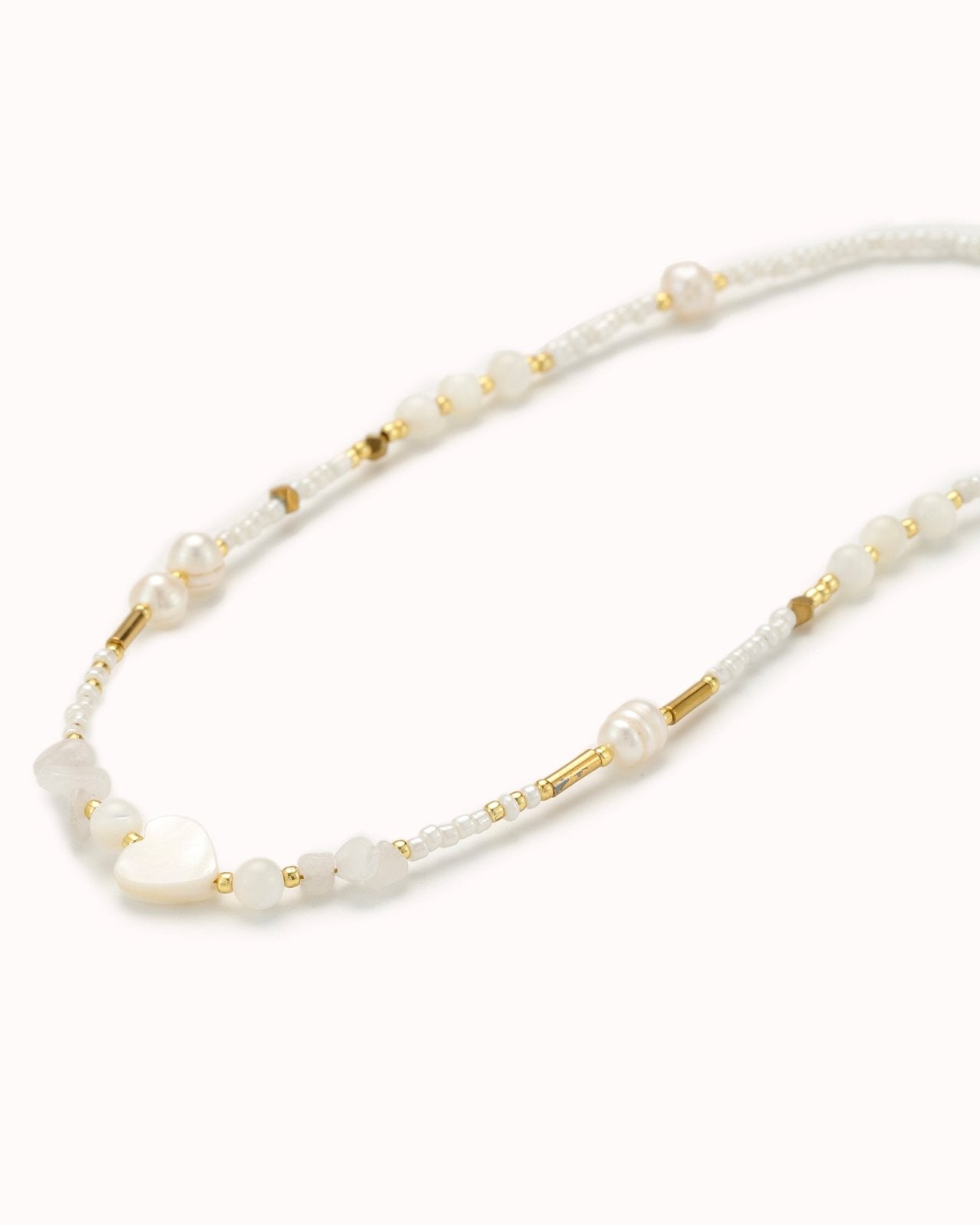 Witte ketting met gouden details - Nouka