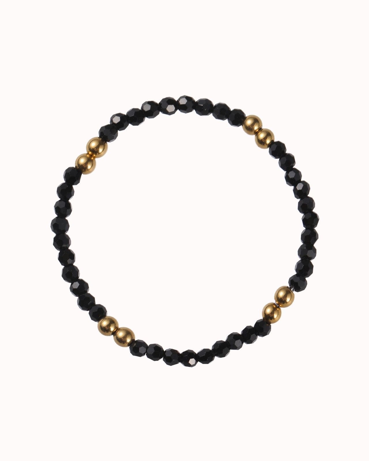 Zwarte kralen armband met goudkleurige kralen - Nouka