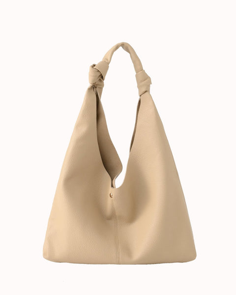 Beige handtas met knoopdetails Nouka