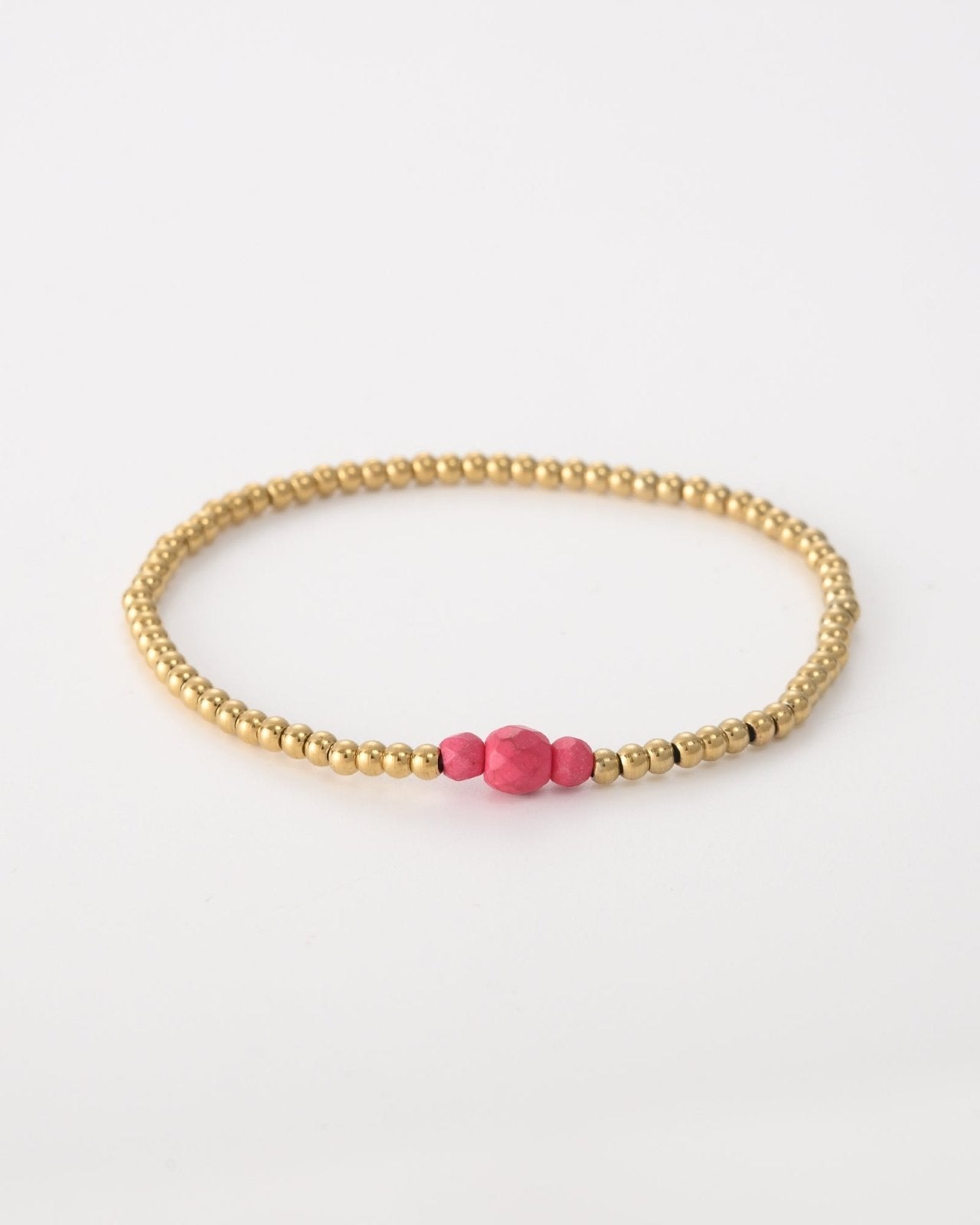 Goudkleurige armband met drie roze kralen - Nouka