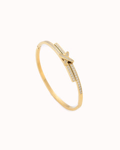 Goudkleurige bangle met kruisje en ingelegde steentjes - Nouka