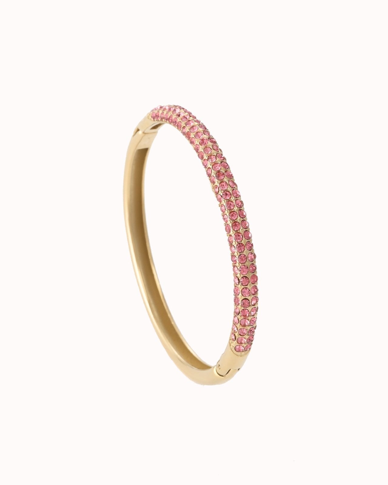 Goudkleurige bangle met roze steentjes - Nouka