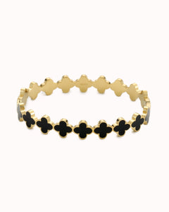 Goudkleurige bangle met zwarte klavertjes - Nouka