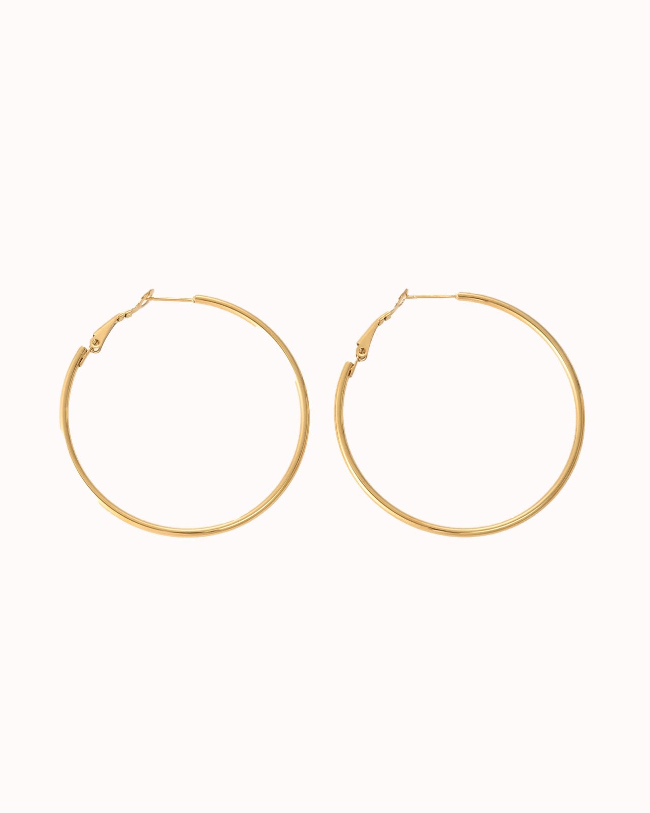 Goudkleurige minimalistische hoops 70mm - Nouka