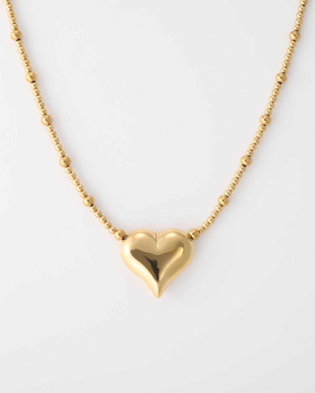 Goudkleurige statement ketting met hart - Nouka