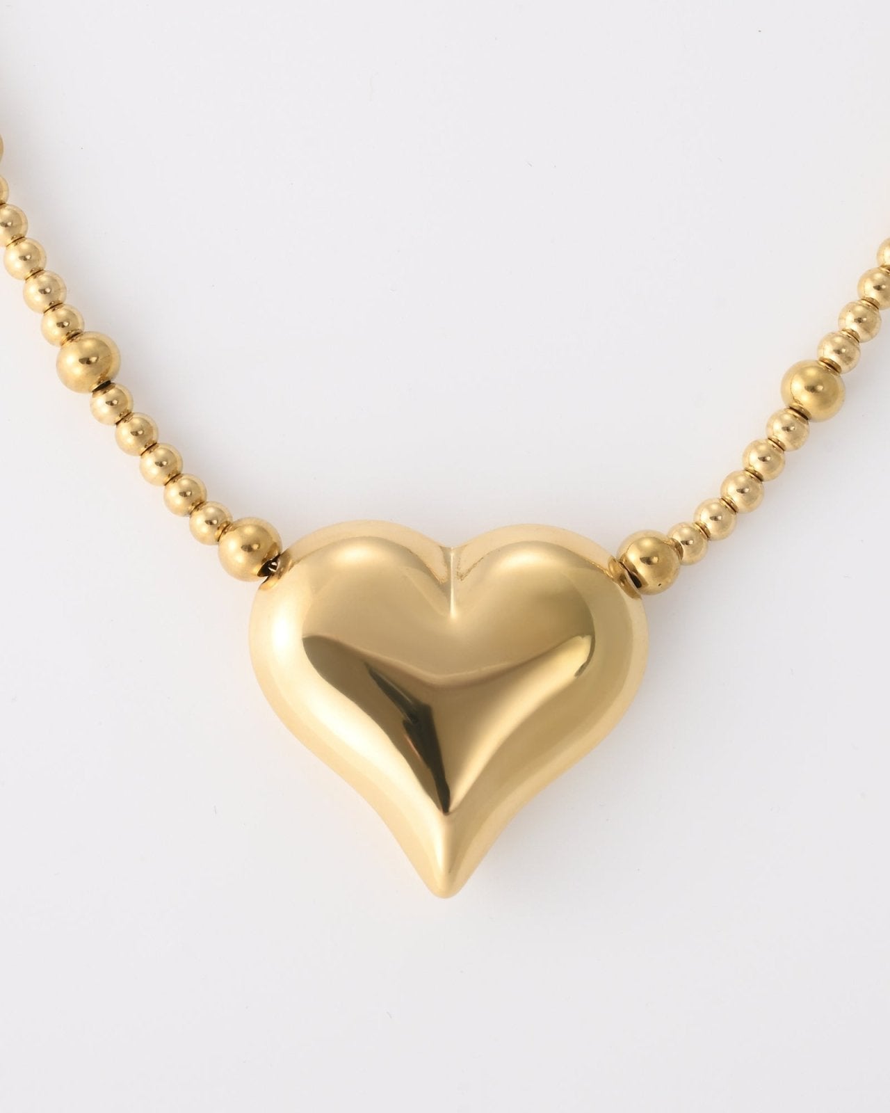 Goudkleurige statement ketting met hart - Nouka