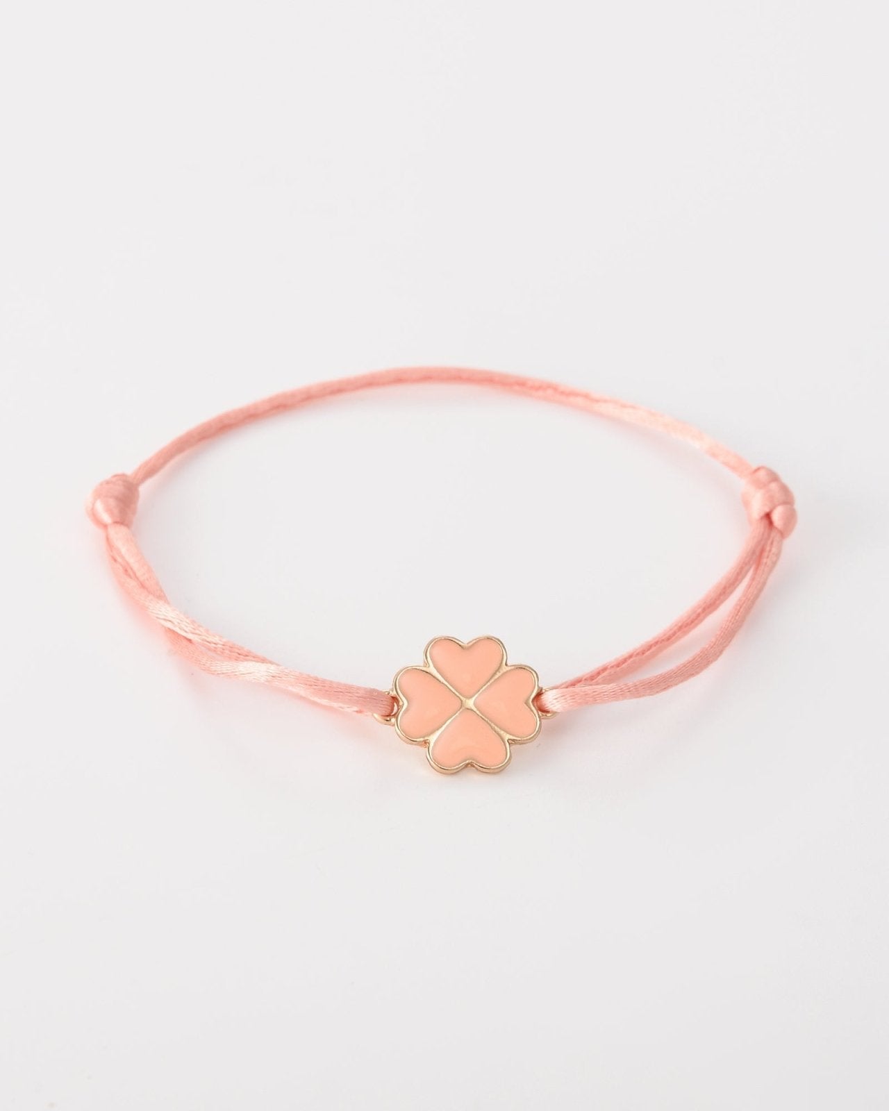 Peach touwtjes armbandje met een klavertje - Nouka