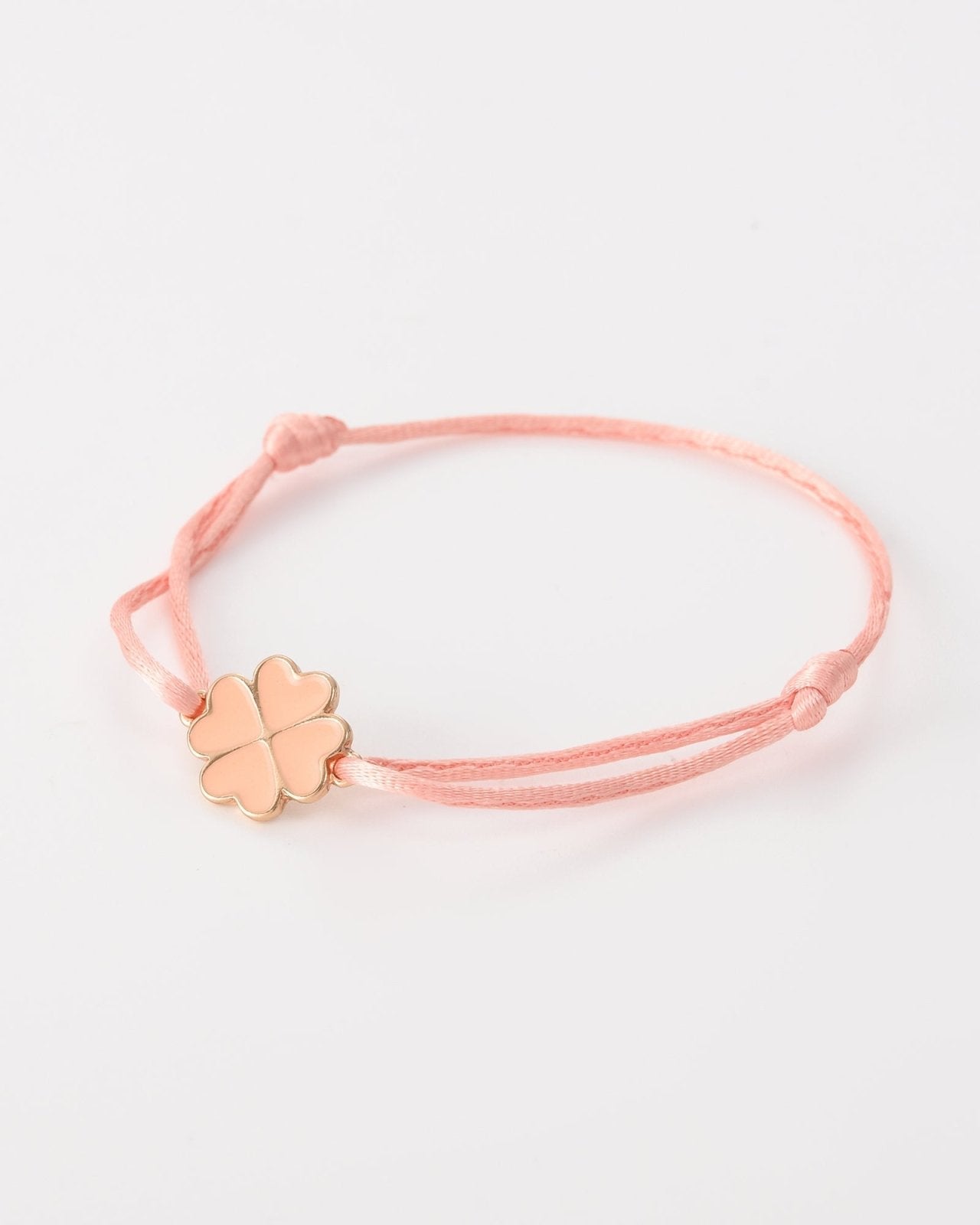 Peach touwtjes armbandje met een klavertje - Nouka