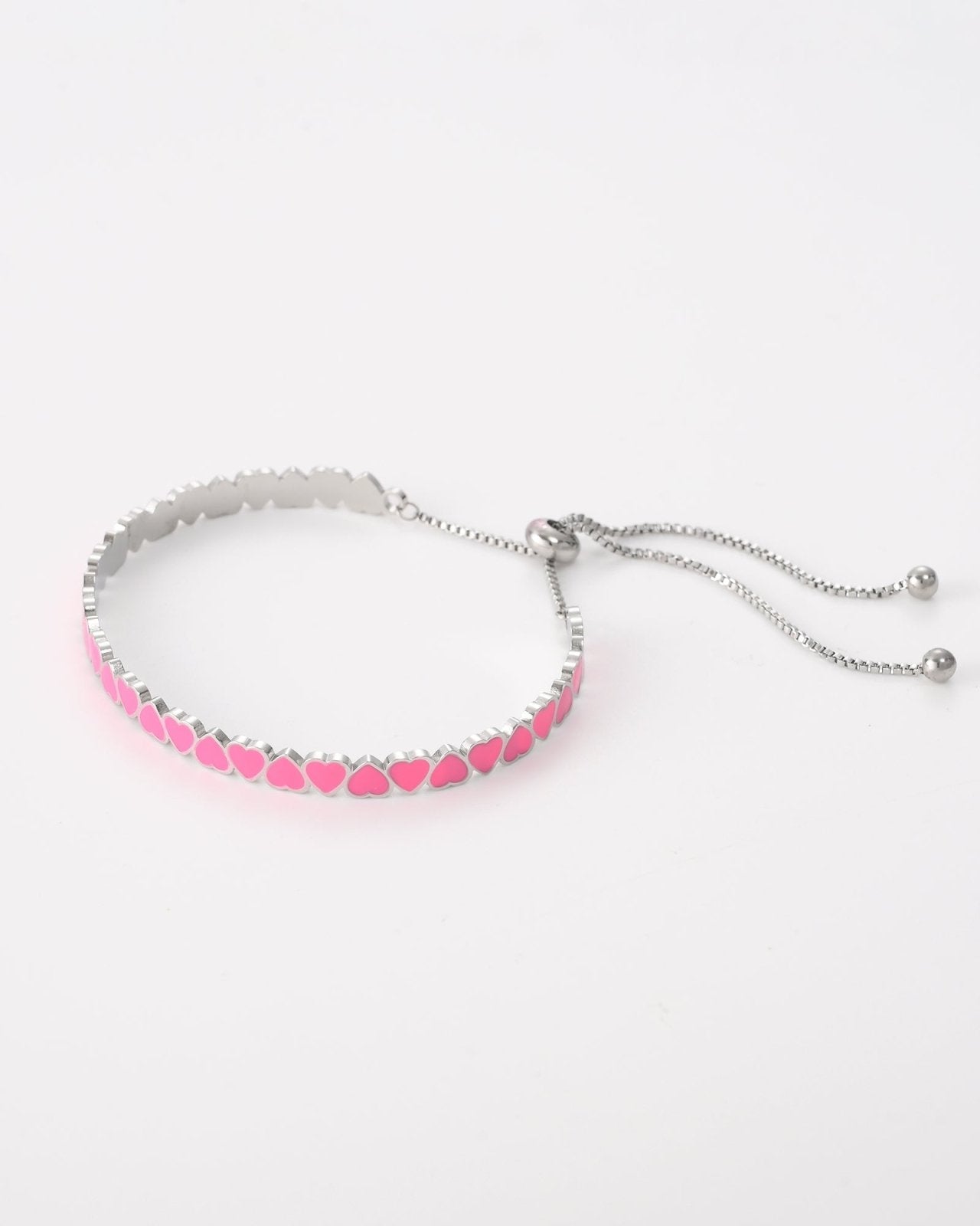 Zilverkleurige bangle met roze hartjes - Nouka