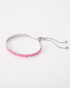 Zilverkleurige bangle met roze hartjes - Nouka