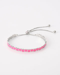 Zilverkleurige bangle met roze hartjes - Nouka